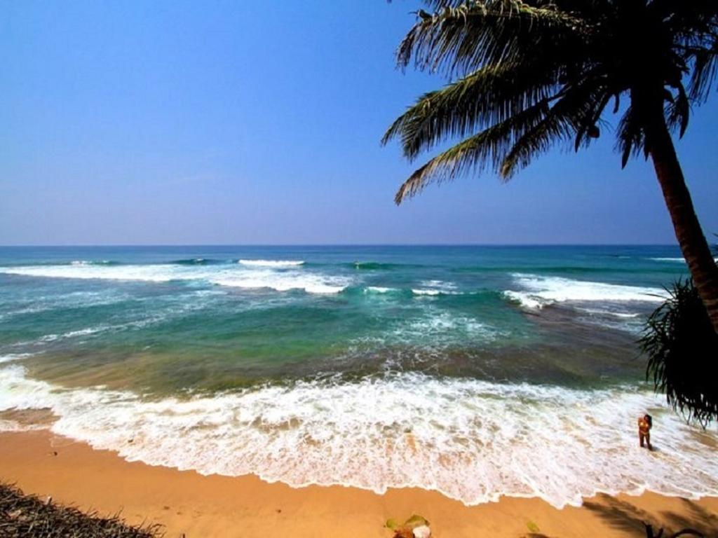 Time N Tide Beach Resort Hikkaduwa Buitenkant foto